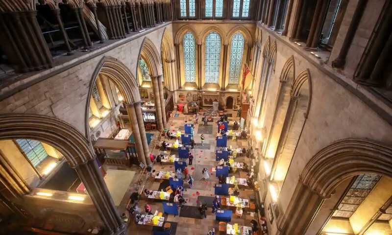 Cubicles are seen inside Salisbury Cathedral, Wiltshire, for people to receive an injection of the Pfizer coronavirus vaccine. Photograph: Steve Parsons/PA